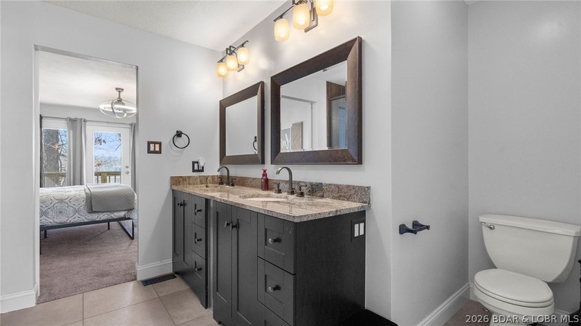 Experience elevated lakefront living in this luxury 4-bedroom, 3 - photo 23
