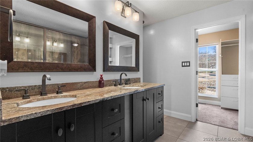 Experience elevated lakefront living in this luxury 4-bedroom, 3 - photo 24
