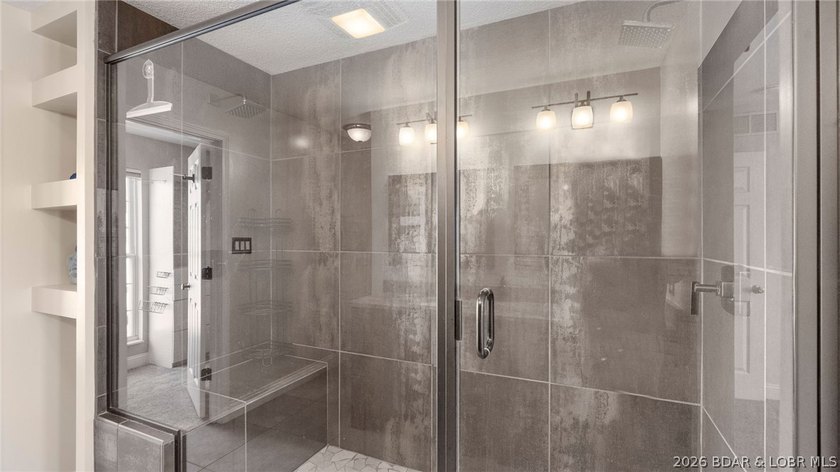 Experience elevated lakefront living in this luxury 4-bedroom, 3 - photo 25