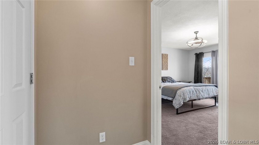 Experience elevated lakefront living in this luxury 4-bedroom, 3 - photo 27