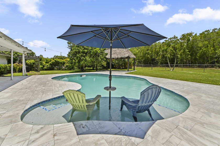 Welcome to 7635 Oakmont Drive in Lake Worth, a charming - photo 27