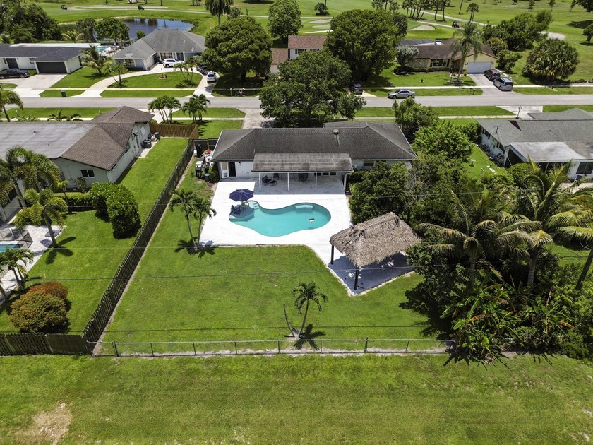 Welcome to 7635 Oakmont Drive in Lake Worth, a charming - photo 34