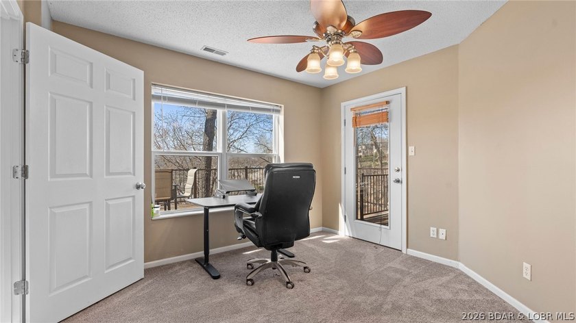 Experience elevated lakefront living in this luxury 4-bedroom, 3 - photo 36