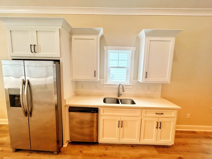 ONE LEVEL. MAPLE PLAN. This 2023 build has tons of upgrades - photo 7