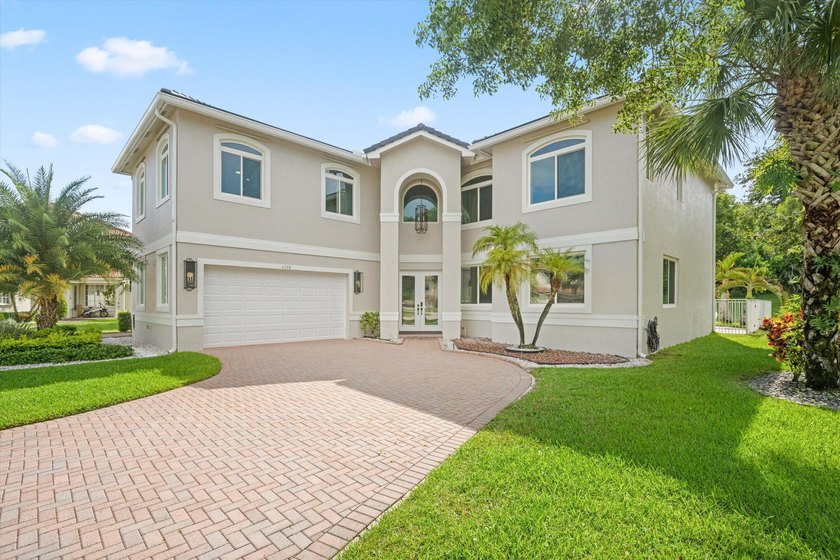 Located in the prestigious Regatta Bay neighborhood of The Isles - photo 5