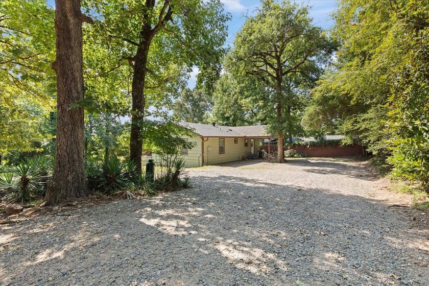 Just a few steps from Lake O' the Pines, this fully furnished - photo 20