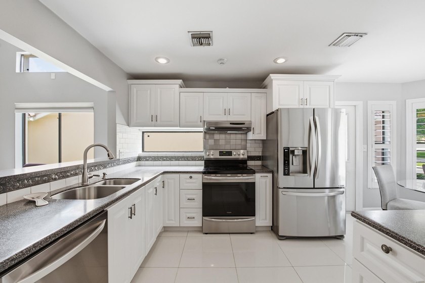 BOCA! AAA+ Schools. Super Low HOA! PRIVATE Backyard! AMAZING - photo 3