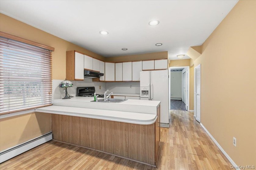 Oversized Cape Cod with All Large Rooms Nestled on Huge Lot on - photo 9