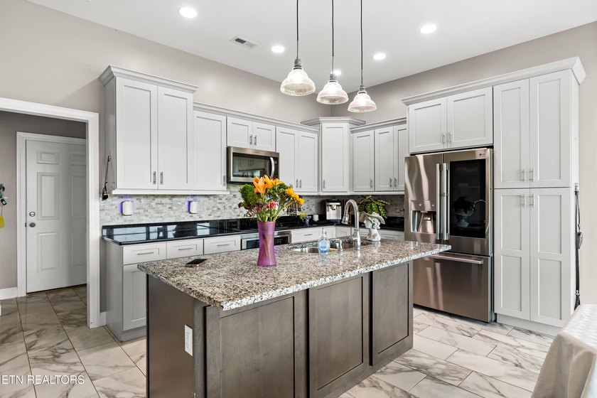 One of a kind! This gorgeous one level ranch home includes - photo 10