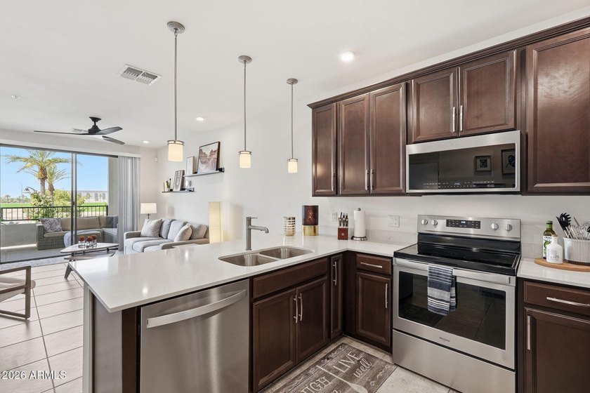 Discover elevated living at The Cays in Downtown Ocotillo! This - photo 3