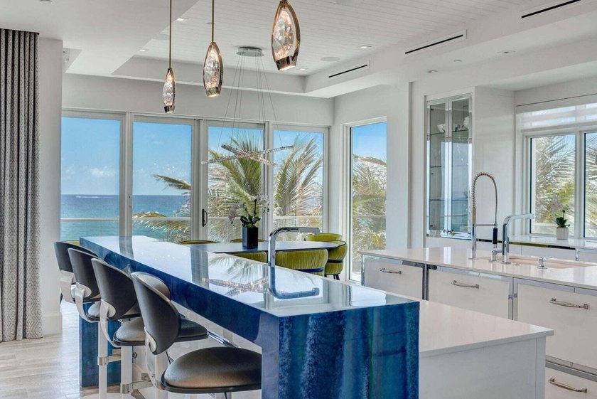 Welcome to this stunning 3-story townhouse in Ocean Ridge. This - photo 16
