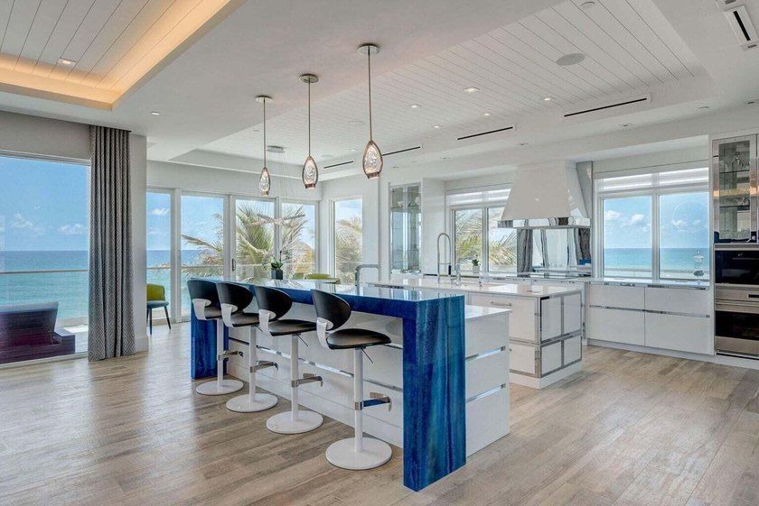 Welcome to this stunning 3-story townhouse in Ocean Ridge. This - photo 17
