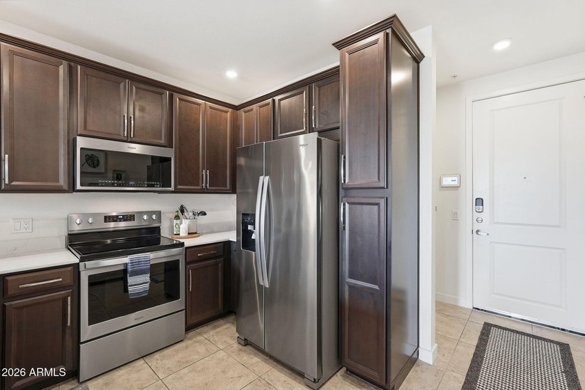 Discover elevated living at The Cays in Downtown Ocotillo! This - photo 8