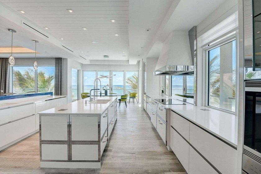 Welcome to this stunning 3-story townhouse in Ocean Ridge. This - photo 19