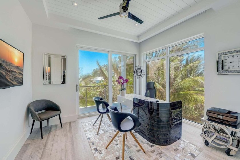 Welcome to this stunning 3-story townhouse in Ocean Ridge. This - photo 23