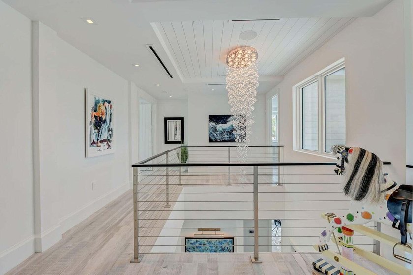 Welcome to this stunning 3-story townhouse in Ocean Ridge. This - photo 30