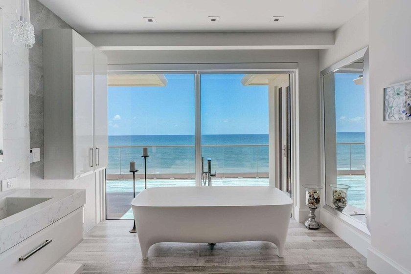 Welcome to this stunning 3-story townhouse in Ocean Ridge. This - photo 38