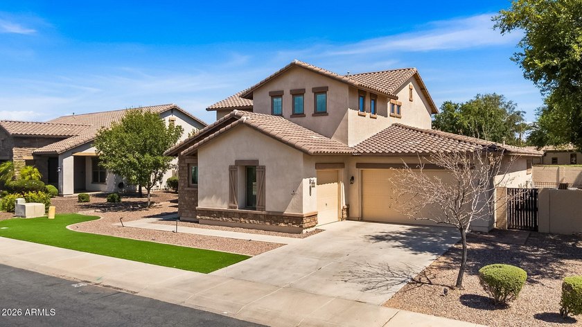 Welcome to this stunning 3,905-square-foot home. Situated on an - photo 3