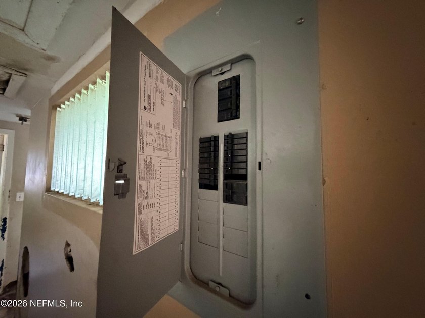 Opportunity awaits! This 1,644-square-foot concrete block home - photo 11