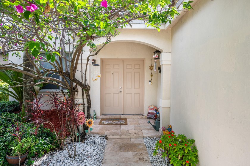 Welcome to this stunning waterfront residence nestled in The - photo 4