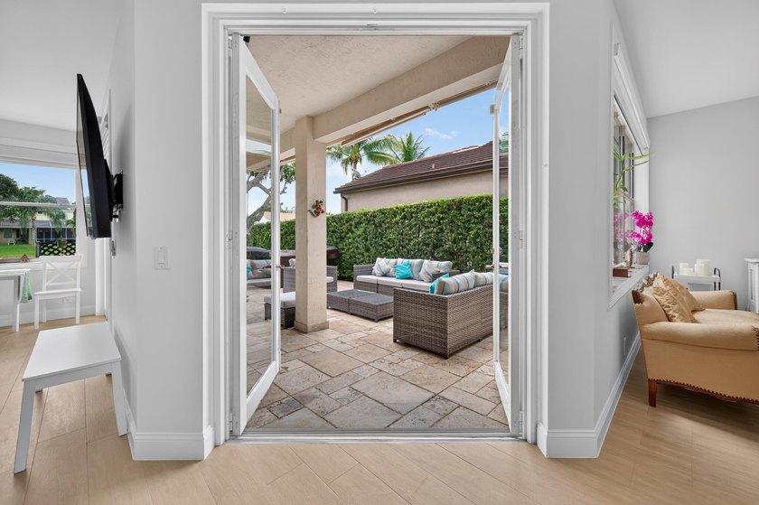 Welcome to this stunning waterfront residence nestled in The - photo 8