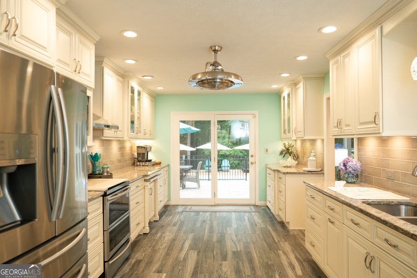 Welcome home to this beautifully maintained 4-bedroom, 2-bath - photo 21