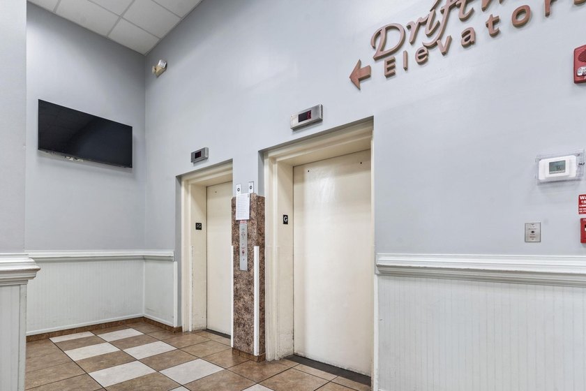 This well-cared for 10th floor sanctuary can either function as - photo 35