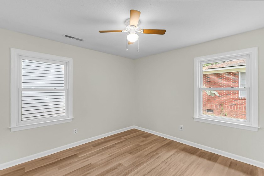 Situated on a spacious lot at 5433 Pennsylvania Avenue, this - photo 13