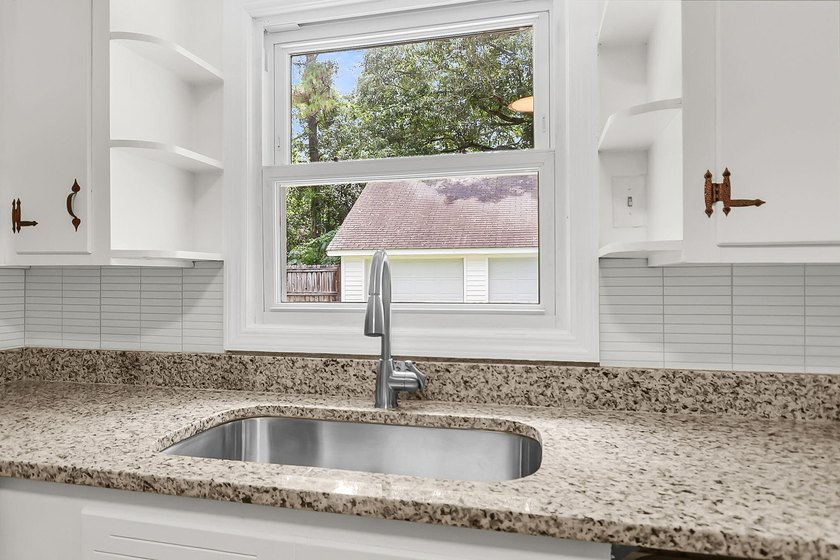 Situated on a spacious lot at 5433 Pennsylvania Avenue, this - photo 23