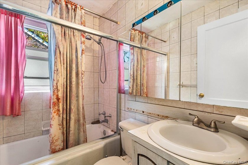 Welcome to this charming 2-bedroom, 1-bath duplex co-op located - photo 12