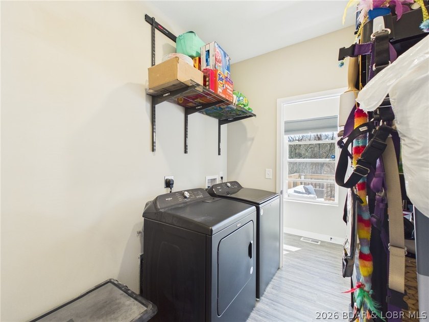 Welcome to this spacious 5-bedroom, 4-bath home in the highly - photo 14