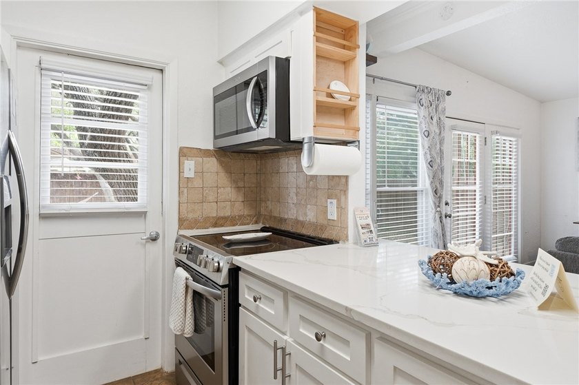 Charming 3-bedroom, 1.5-bath home currently operating as a - photo 19