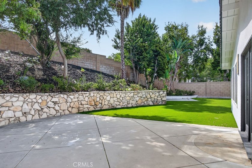 Beautifully updated single-level home on a private corner lot in - photo 33