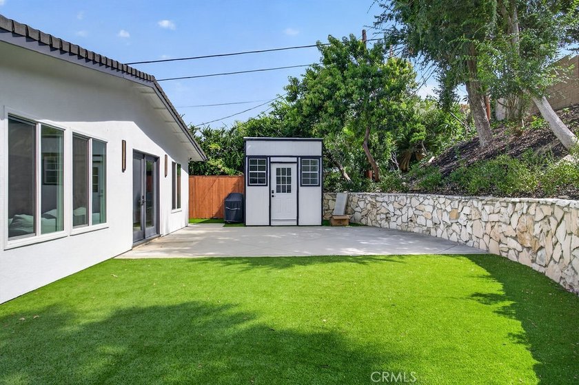 Beautifully updated single-level home on a private corner lot in - photo 35
