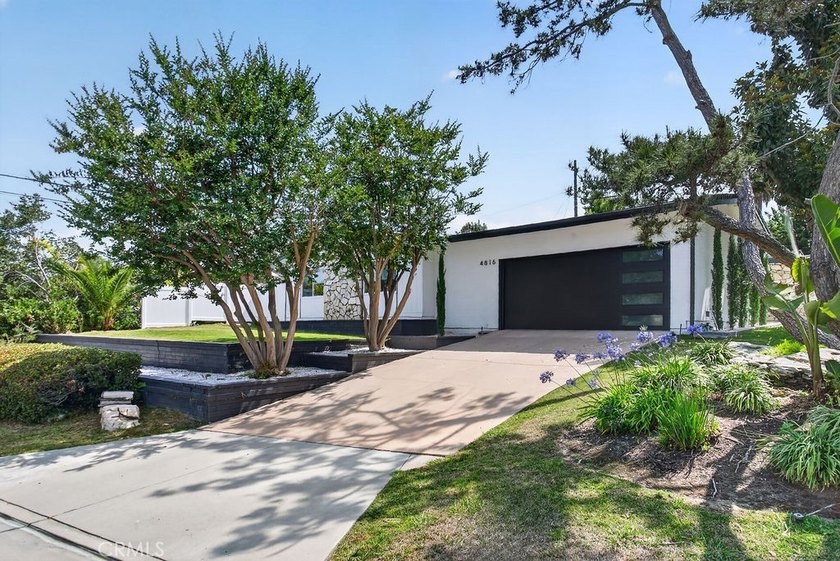 Beautifully updated single-level home on a private corner lot in - photo 39
