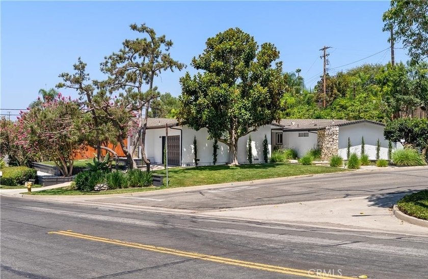 Beautifully updated single-level home on a private corner lot in - photo 41