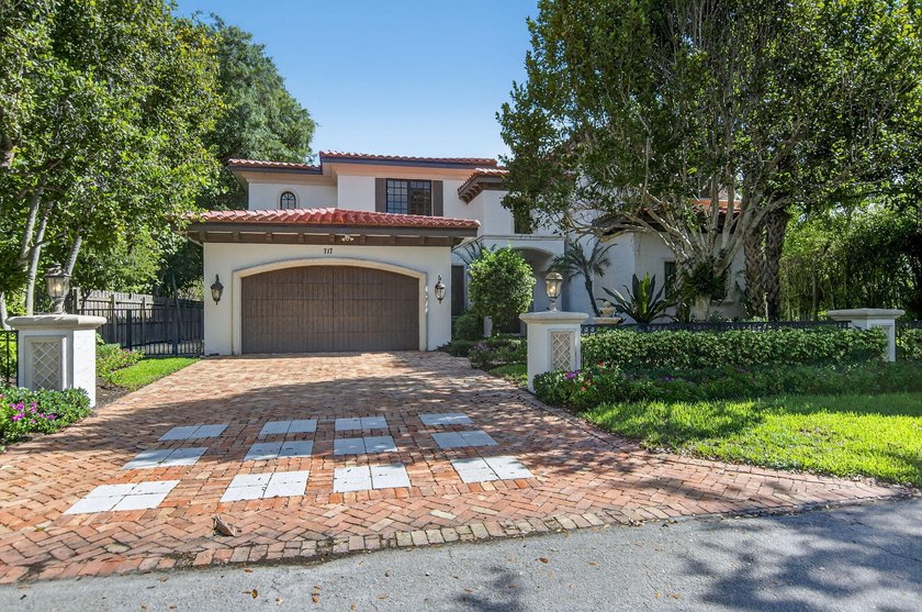 Situated on an oversized lot at the end of a quiet, tree-lined - photo 3