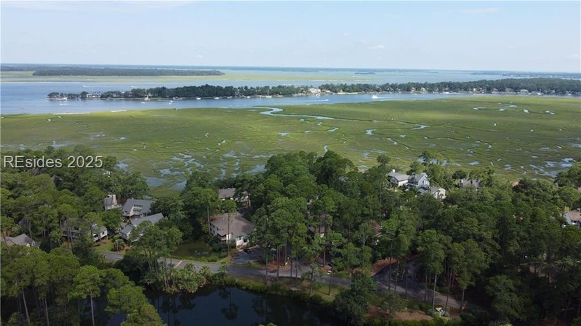 Premium townhome lot with serene lake views in highly desirable - photo 11