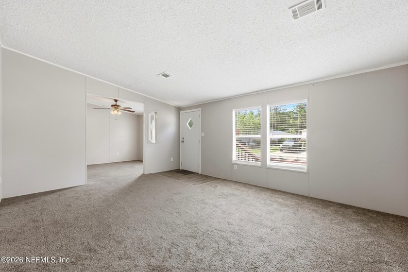 Welcome home! This home offers comfortable living with a relaxed - photo 3