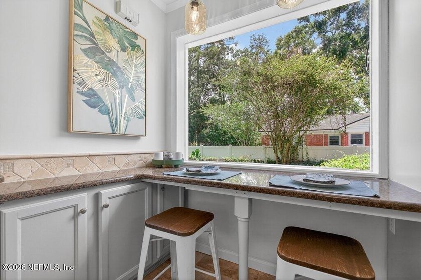 Timeless charm meets modern living in this beautifully updated - photo 8