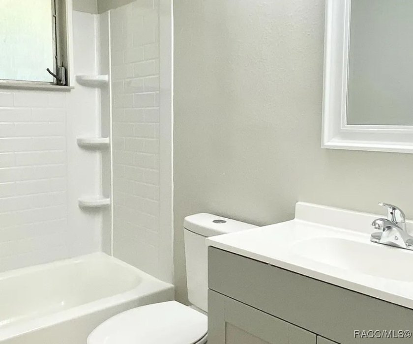 This 3-bedroom, 1.5-bath home offers a functional layout with a - photo 3