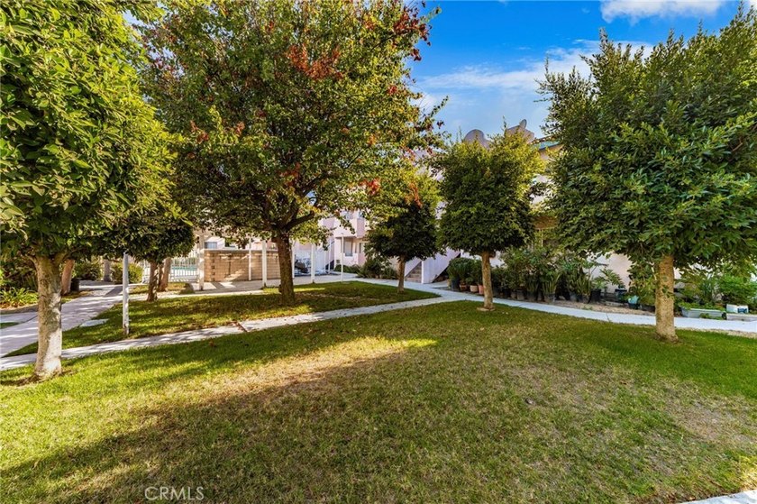 Welcome to this ground-level condominium nestled in the - photo 24