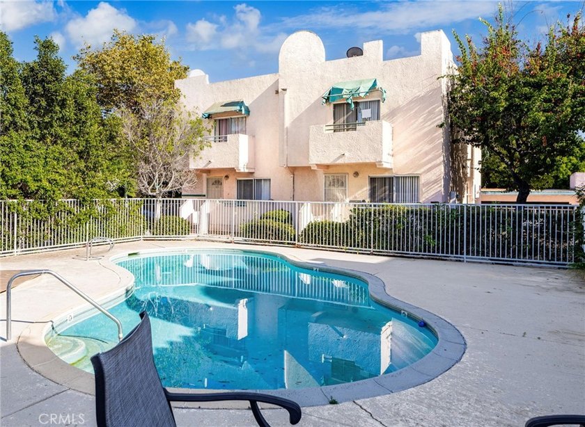 Welcome to this ground-level condominium nestled in the - photo 25