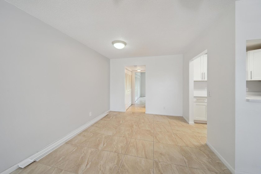 Welcome to this updated 1-bedroom, 1.5-bathroom condo is - photo 5