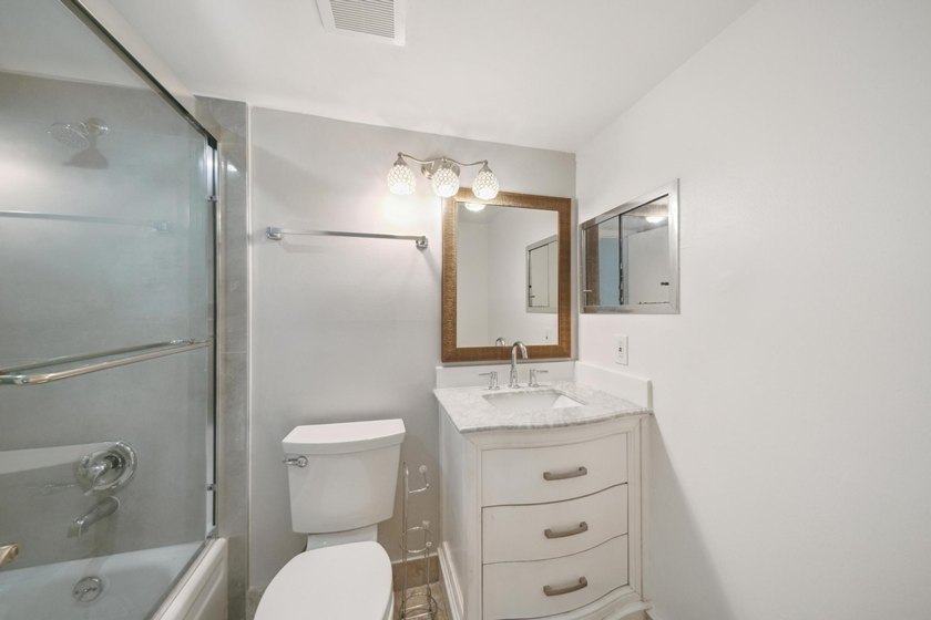 Welcome to this updated 1-bedroom, 1.5-bathroom condo is - photo 9