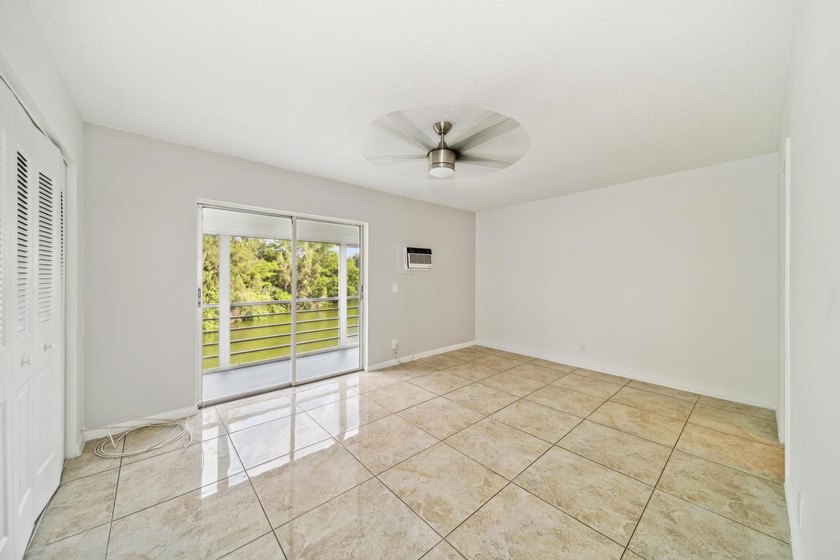 Welcome to this updated 1-bedroom, 1.5-bathroom condo is - photo 10