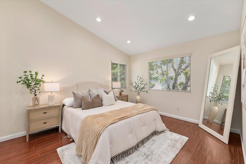 Indulge in the serenity of this beautifully updated top-floor - photo 7