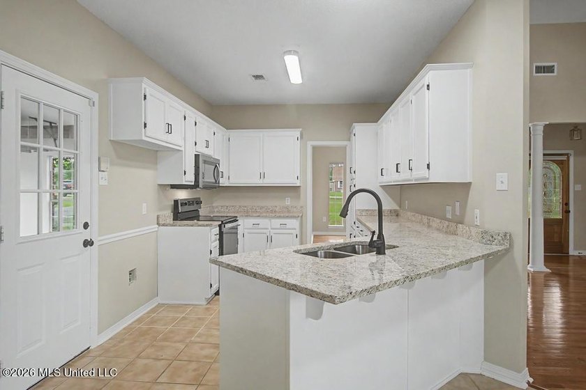 Great opportunity to own this waterfront home situated on - photo 2