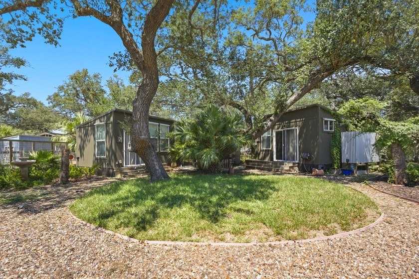 This one-of-a-kind coastal retreat blends island-style charm - photo 2
