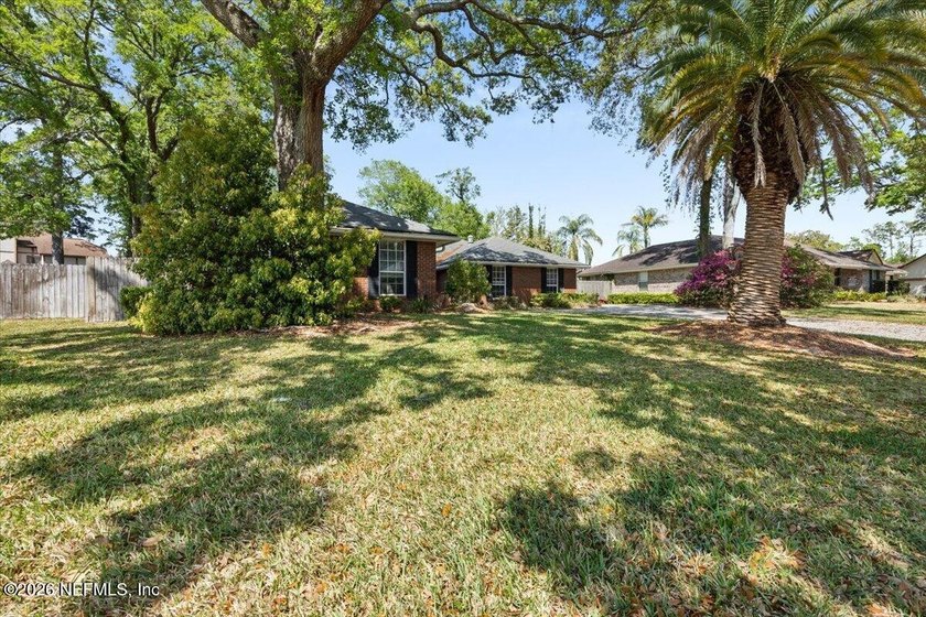 This spacious 5-bedroom, 4-bathroom brick home in the desirable - photo 3
